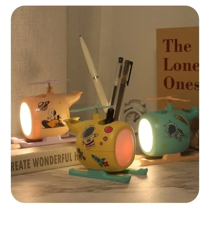 Airplane-shaped night light with USB rechargeable LED, offering eye-comforting glow, perfect for kids' rooms or office decor, 3 colors available.