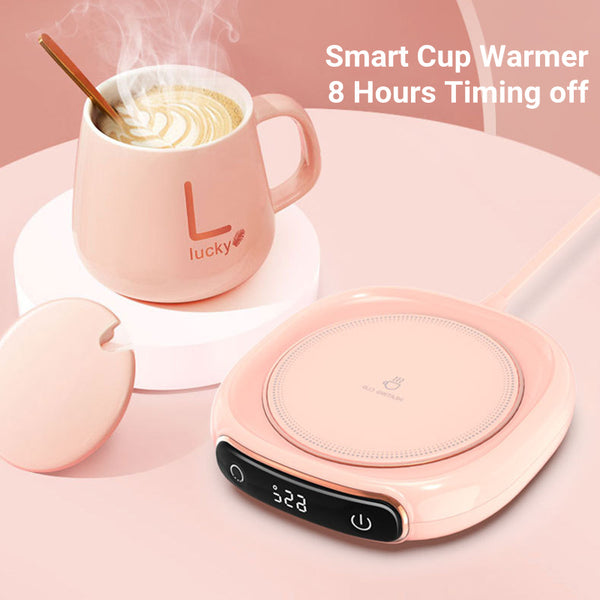 Pink smart coffee mug warmer with thermal insulation and digital display, ideal for keeping beverages warm, shown on a pink background.