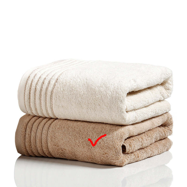 Soft Cotton Towel Set featuring luxurious, absorbent bath towels in neutral colors, ideal for modern bathroom decor.