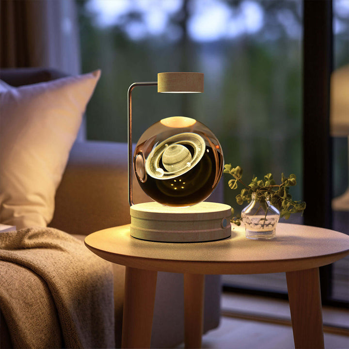 Crystal ball night light with 3D design on bedside table, creating a cozy ambiance with warm LED lighting. Ideal for Japandi decor.