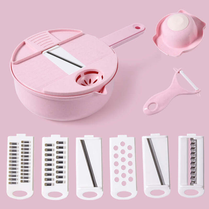 Pink multifunctional vegetable shredder with interchangeable blades for slicing and shredding, featuring a durable design.