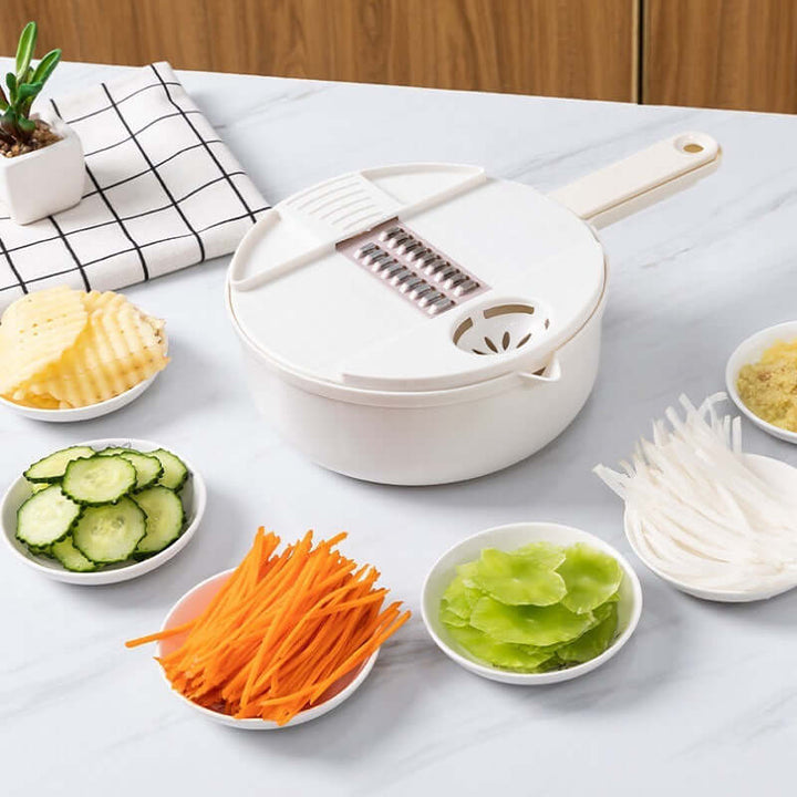 Kitchen Multifunctional Vegetable Shredder with stainless iron blades, showcasing sliced vegetables on a kitchen counter.