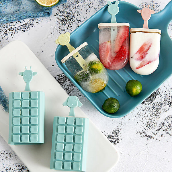 DIY ice cream mold with homemade fruit popsicles on a blue tray, featuring BPA-free plastic molds with cute animal handles.