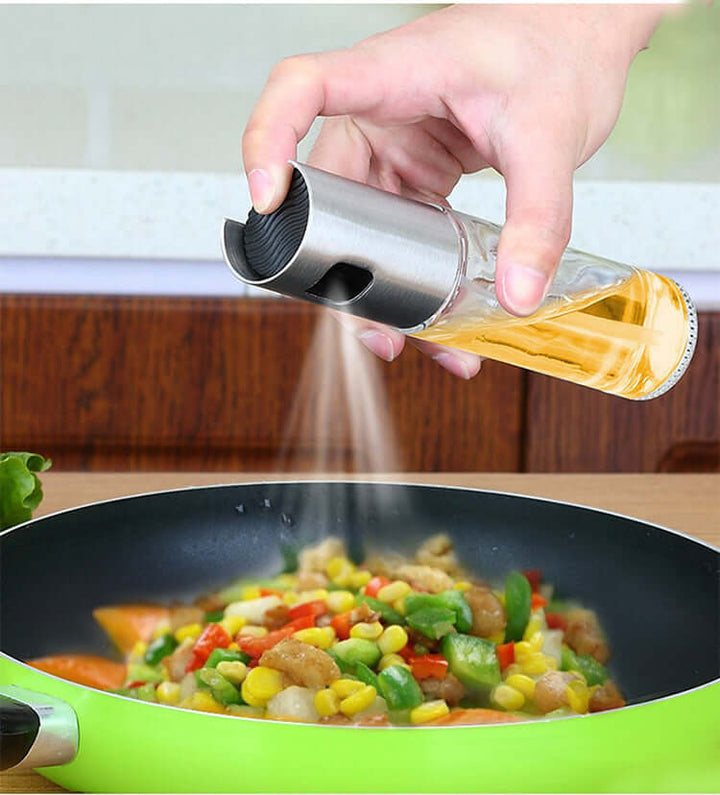 Using BBQ Oil & Vinegar Spray Bottle for healthy cooking on vegetables