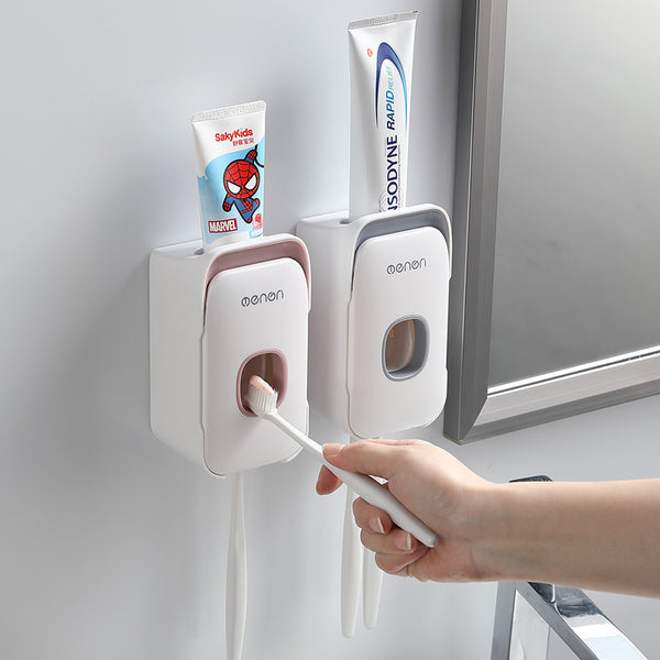 Hands-free automatic toothpaste dispenser in a modern bathroom, showing mess-free and hygienic operation.