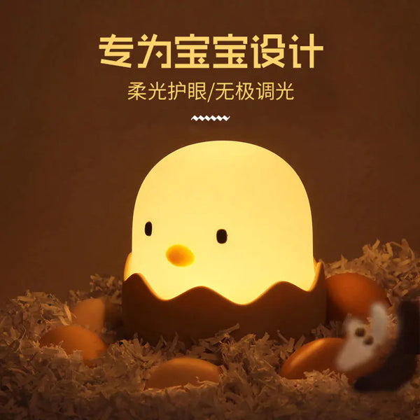 Eggshell Night Light for Kids glowing in warm 3000K mode, nestled in brown bedding, perfect for cozy nurseries.