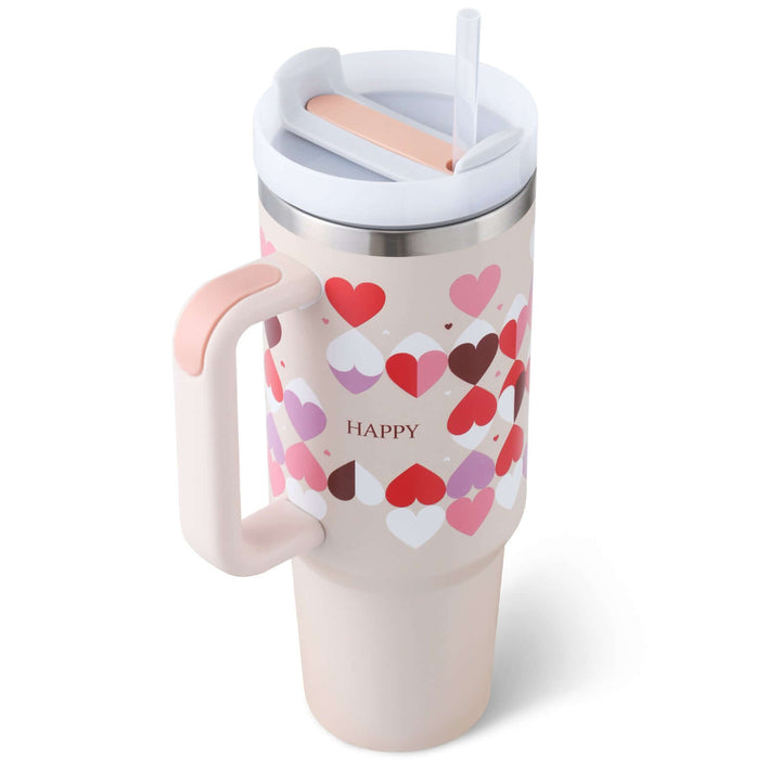 Happy tumbler with heart design, handle, and straw, insulated for hot or cold beverages, ideal for on-the-go refreshment.