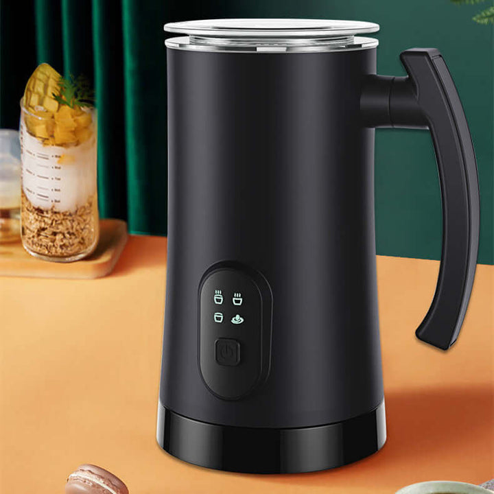 Automatic stainless steel electric milk frother on kitchen counter