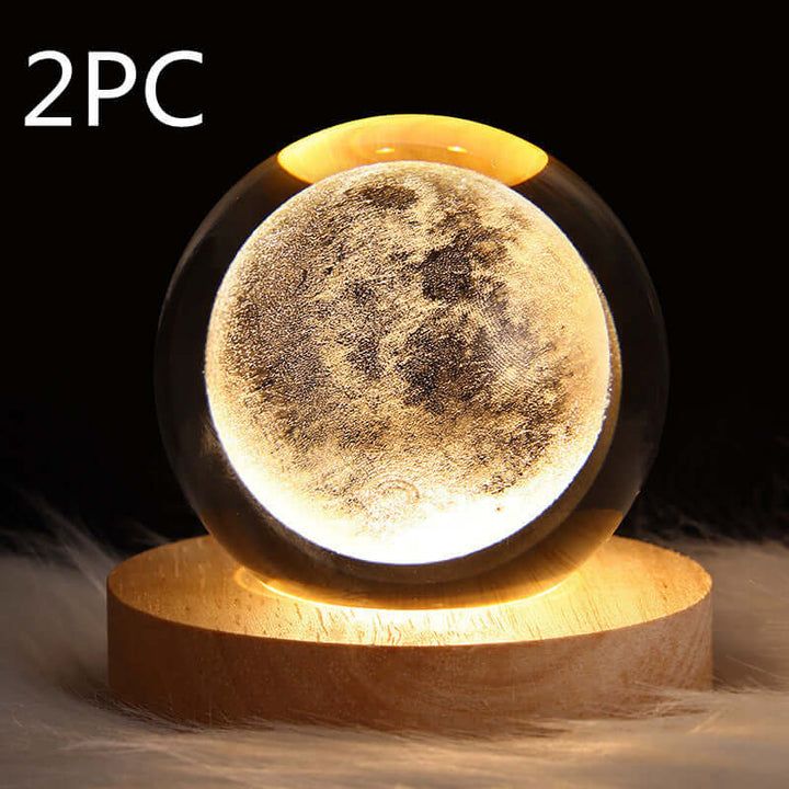 Luminous starry sky crystal ball night lamp with moon projection, biophilic design and cozy ambience lighting.