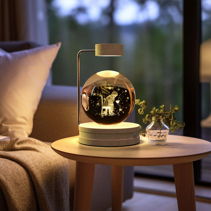 Crystal Ball Night Light with 3D pattern on a bedside table, creating a cozy ambiance with warm LED lighting. Perfect for bedrooms.