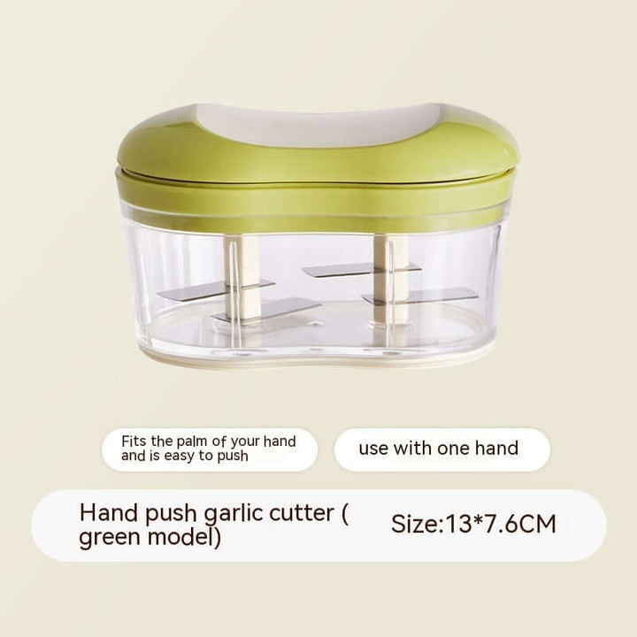 Hand push garlic press in green, compact kitchen tool for easy garlic cutting; fits palm, one-hand use, size 13x7.6 cm.