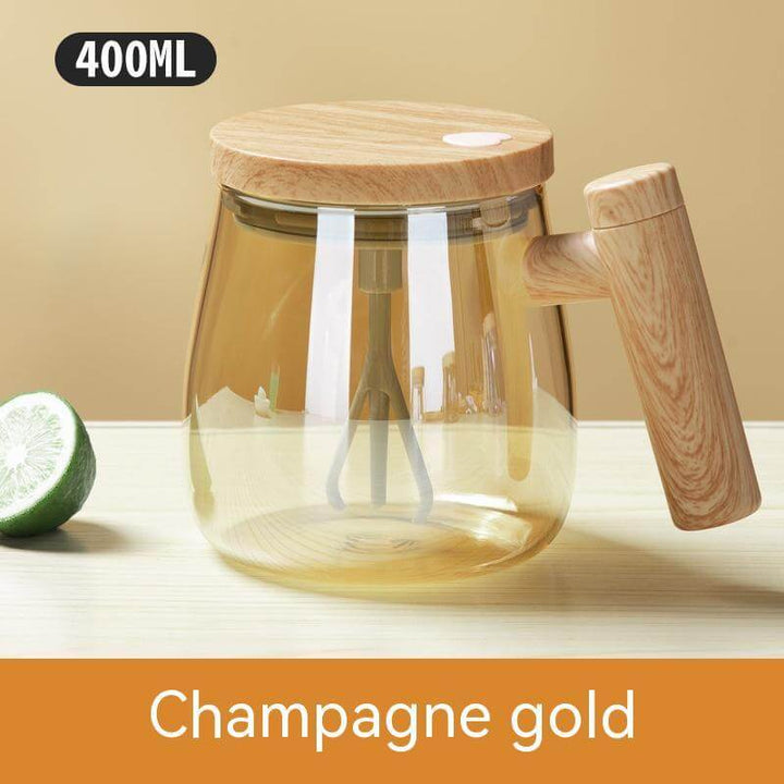 Champagne gold 400ML self-stirring coffee mug with wooden handle and lid on a table, ideal for home or office.