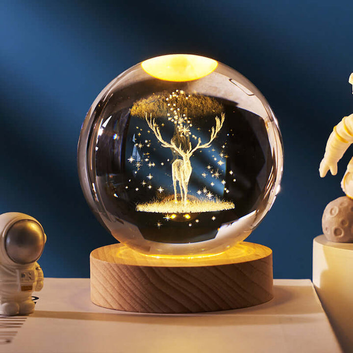 Luminous Starry Sky Crystal Ball Night Lamp with 3D planet projection on wooden base, featuring a cosmic-inspired design.