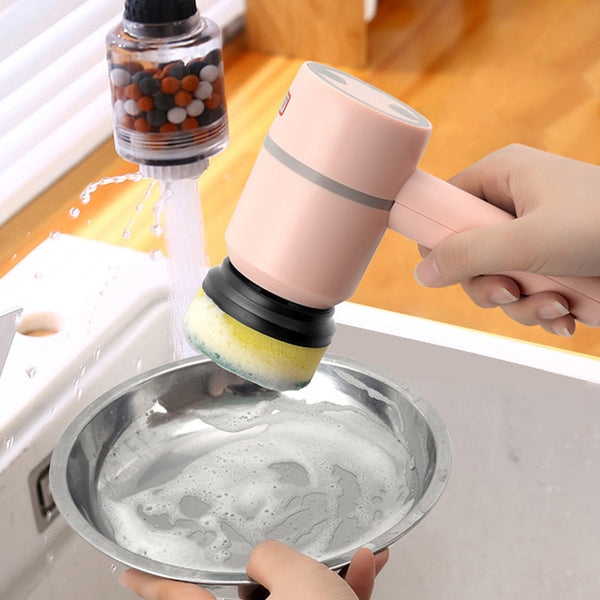 Person using rechargeable electric cleaning brush for kitchen dishwashing.