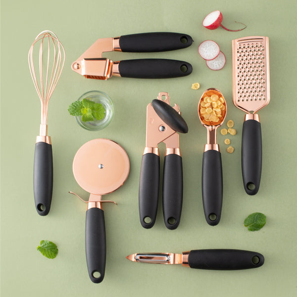 Copper-plated kitchen utensil set for easy fruit and vegetable prep, featuring ergonomic handles and stylish design.