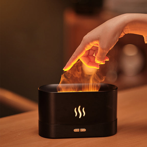 Fire Flame Aroma Diffuser with flame effect and hand, perfect for biophilic design and cozy Japandi style decor.