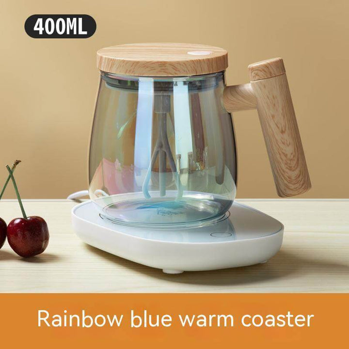 400ML glass kettle with wooden handle on a white warming coaster, cherry beside, labeled 'Rainbow blue warm coaster'.