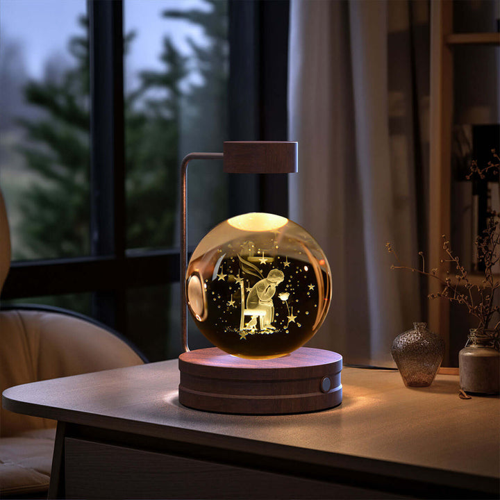 Crystal Ball Night Light on desk, USB-powered with 3D warm LED, biophilic design, perfect for cozy reading nooks or a Japandi style.