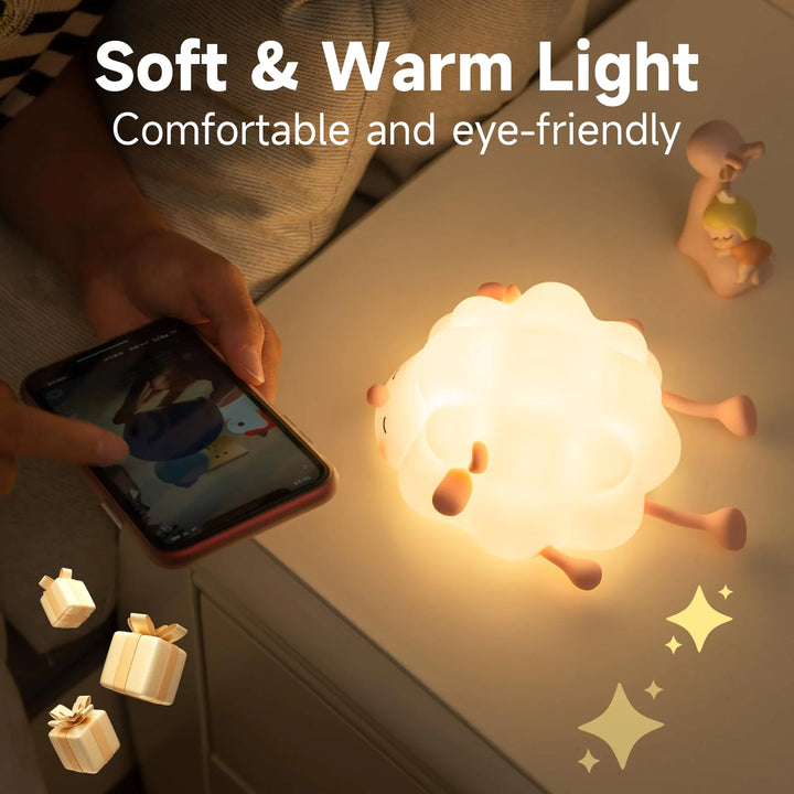 Soft glowing sheep silicone night light on a bedside table, perfect for children, rechargeable and dimmable for eye-friendly comfort.