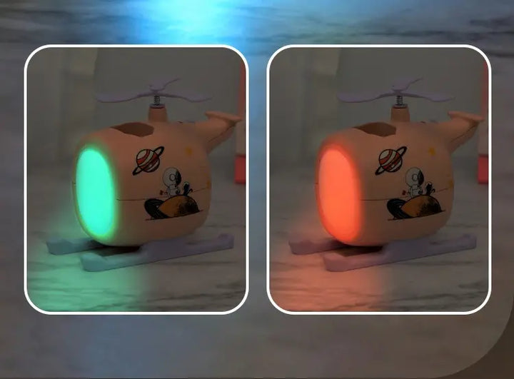Airplane-shaped LED night light showing green and red colors, USB rechargeable, perfect for kids' rooms or travel with durable build.