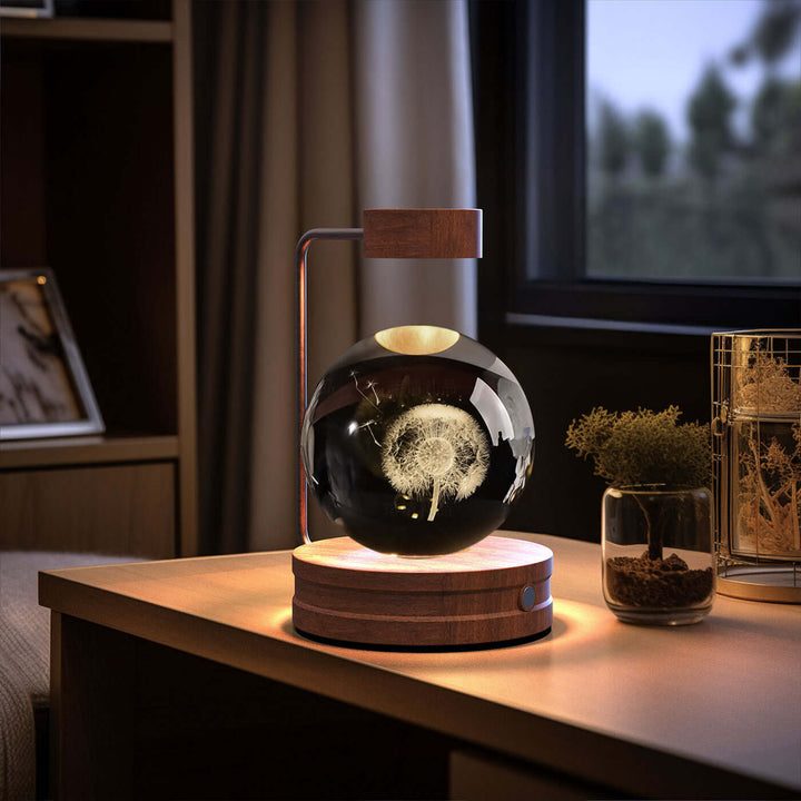 Crystal Ball Night Light with 3D pattern on a wooden desk, USB-powered, eco-friendly decor for cozy reading nooks and Japandi style.