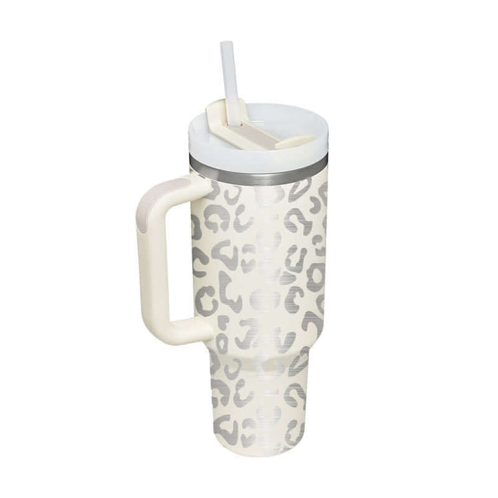 40 Oz tumbler with handle and straw, insulated stainless steel, leopard print design, ideal for hot coffee and iced drinks.