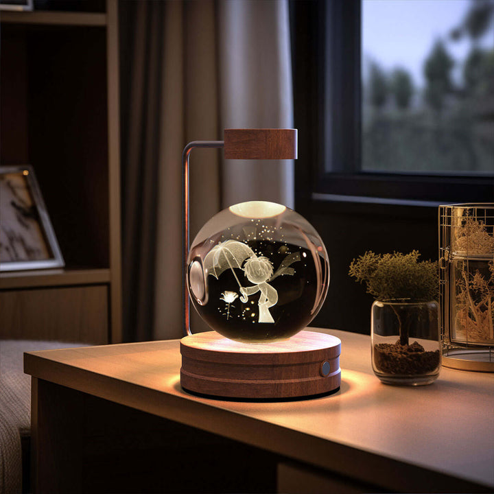 Crystal Ball Night Light with 3D dinosaur pattern on a wooden bedside table, featuring cozy warm LED lighting and USB-powered design.