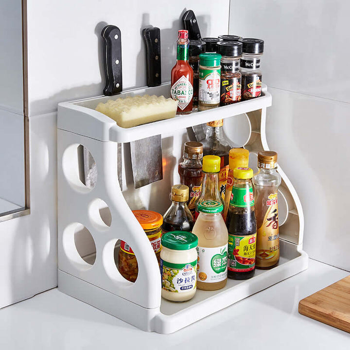 Multilayer kitchen storage shelf organizing spices and condiments, featuring a space-saving design for efficient kitchen use.