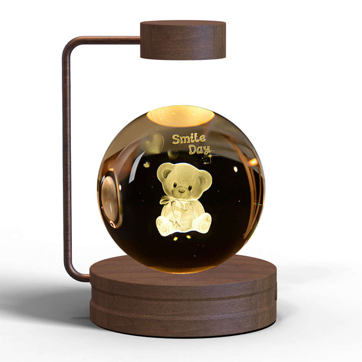 Crystal ball night light with bear design, warm LED glow for cozy ambiance, USB-powered, ideal for bedrooms and living rooms.