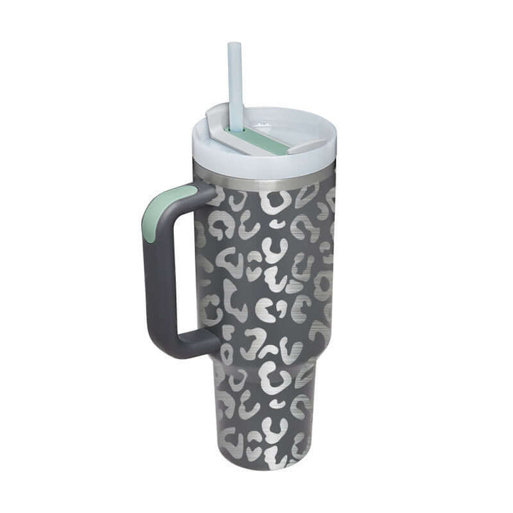 40 Oz insulated stainless steel tumbler with handle and straw, leopard print design, spill-proof lid; perfect for hot or cold drinks.