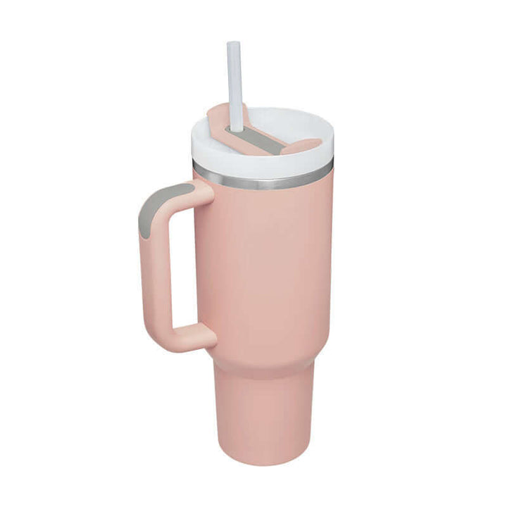 40 Oz pink insulated stainless steel tumbler with handle and straw, perfect for hot or cold drinks indoors or in the garden.