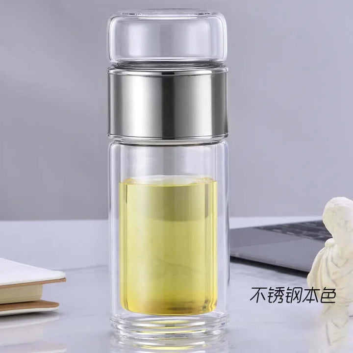 Glass tea infuser bottle with double-layer design and stainless steel filter, ideal for home or on-the-go tea enthusiasts.