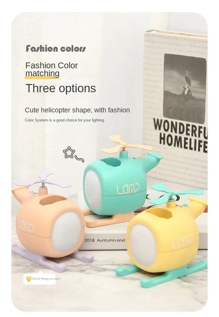 Helicopter-shaped night lights in pastel colors on display with fashion color options for modern decor.
