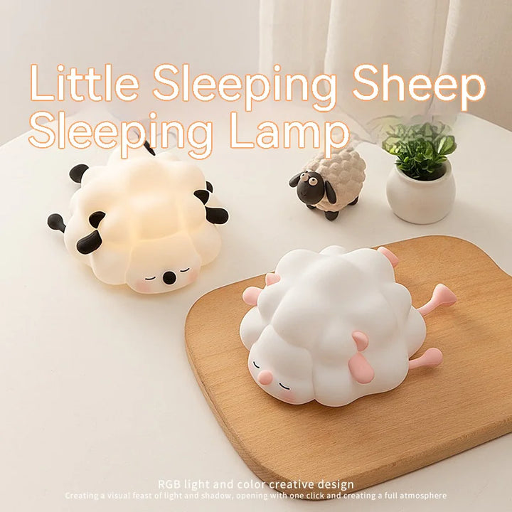 Adorable sheep silicone night light on wooden tray, rechargeable and dimmable, perfect for kids' bedrooms. Soft, safe, cuddly design.